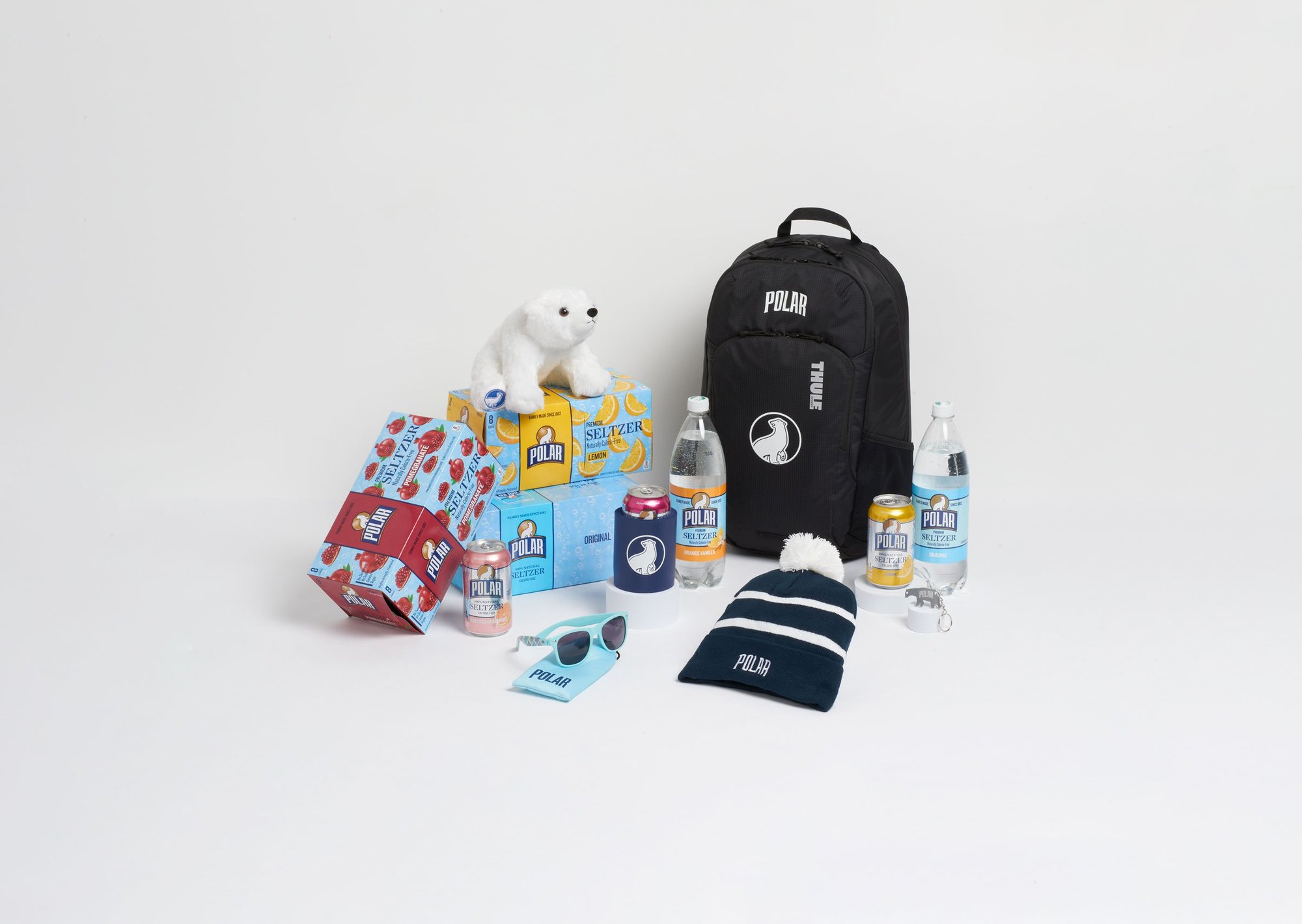 Polar branded back pack, beanie hat, sunglasses and other merch.